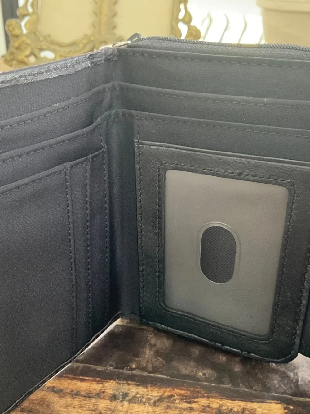Wilson’s black leather wallet